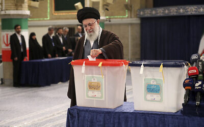 In this photo released by the office of the Iranian supreme leader, Supreme Leader Ayatollah Ali Khamenei casts his ballot during the parliamentary and Assembly of Experts elections in Tehran, Iran, March 1, 2024 (Office of the Iranian Supreme Leader via AP).