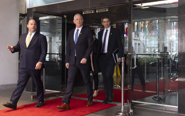 Benny Gantz, center, a key member of Israel's War Cabinet and the top political rival of Israeli Prime Minister Benjamin Netanyahu, leaves after a meeting at the State Department, Tuesday, March 5, 2024, in Washington. (AP Photo/Mark Schiefelbein) Benny Gantz, center, a key member of Israel's War Cabinet and the top political rival of Israeli Prime Minister Benjamin Netanyahu, leaves after a meeting at the State Department, Tuesday, March 5, 2024, in Washington. (AP Photo/Mark Schiefelbein)