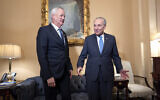 Benny Gantz, left, a key member of Israel's War Cabinet is welcomed by Senate Majority Leader Chuck Schumer, for a private meeting at the Capitol in Washington, March 5, 2024. (AP Photo/J. Scott Applewhite)