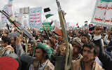 Houthi supporters attend a rally against the US airstrikes on Yemen and the Israeli offensive against Hamas in Gaza Strip, in Sanaa, Yemen, March 8, 2024. (AP Photo/Osamah Abdulrahman)