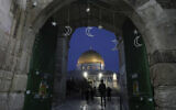 Muslims walk next to the Dome of Rock Mosque at the Al-Aqsa Mosque compound atop the Temple Mount in Jerusalem's Old City, Sunday, March 10, 2024. (AP/Mahmoud Illean)