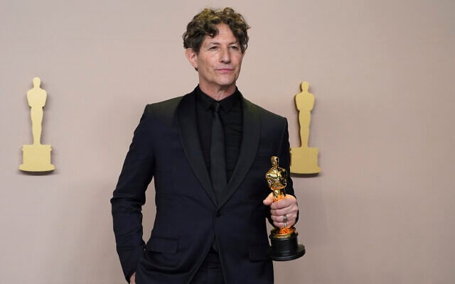 Jonathan Glazer poses with the award for best international feature film for 'The Zone of Interest,' in the press room at the Oscars on March 10, 2024, at the Dolby Theatre in Los Angeles. (Jordan Strauss/Invision/AP) Jonathan Glazer poses with the award for best international feature film for 'The Zone of Interest,' in the press room at the Oscars on March 10, 2024, at the Dolby Theatre in Los Angeles. (Jordan Strauss/Invision/AP)