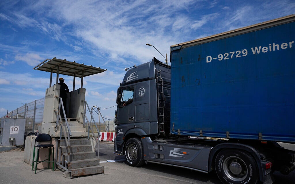 File: A truck carrying humanitarian aid for the Gaza Strip passes through the Kerem Shalom Crossing in southern Israel, Thursday, March 14, 2024. (AP/Ohad Zwigenberg) File: A truck carrying humanitarian aid for the Gaza Strip passes through the Kerem Shalom Crossing in southern Israel, Thursday, March 14, 2024. (AP/Ohad Zwigenberg)