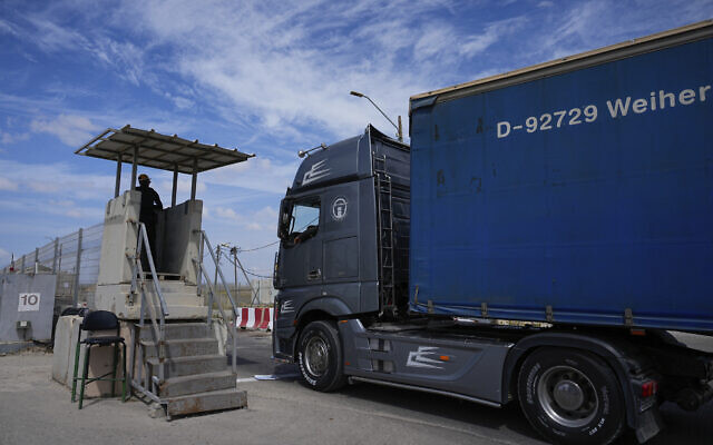 A truck carrying humanitarian aid for the Gaza Strip passes through the Kerem Shalom Crossing in southern Israel, March 14, 2024. (AP Photo/Ohad Zwigenberg) A truck carrying humanitarian aid for the Gaza Strip passes through the Kerem Shalom Crossing in southern Israel, March 14, 2024. (AP Photo/Ohad Zwigenberg)
