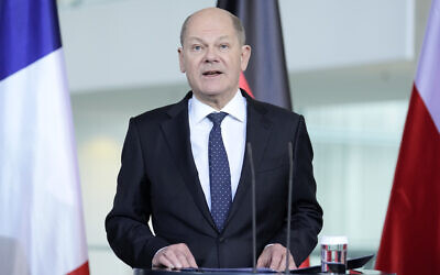 German Chancellor Olaf Scholz speaks to the media at a press conference in Berlin, March 15, 2024. (AP Photo/Ebrahim Noroozi)