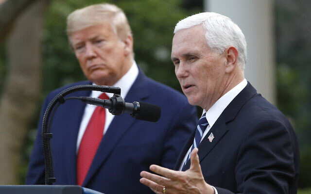 US President Donald Trump listens as Vice President Mike Pence speaks during a briefing at the White House, March 29, 2020, in Washington. (AP Photo/Patrick Semansky, File) US President Donald Trump listens as Vice President Mike Pence speaks during a briefing at the White House, March 29, 2020, in Washington. (AP Photo/Patrick Semansky, File)