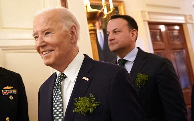 US President Joe Biden, left, and Ireland's Prime Minister Leo Varadkar arrive at a St. Patrick's Day brunch with Catholic leaders in the East Room of the White House, Sunday, March 17, 2024. (AP/Stephanie Scarbrough) US President Joe Biden, left, and Ireland's Prime Minister Leo Varadkar arrive at a St. Patrick's Day brunch with Catholic leaders in the East Room of the White House, Sunday, March 17, 2024. (AP/Stephanie Scarbrough)