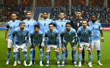 Israel's national soccer team players pose ahead of the Euro 2024 group I qualifying soccer match between Israel and Romania at the Pancho Arena in Felcsut, Hungary, November 18, 2023. (Denes Erdos/AP)