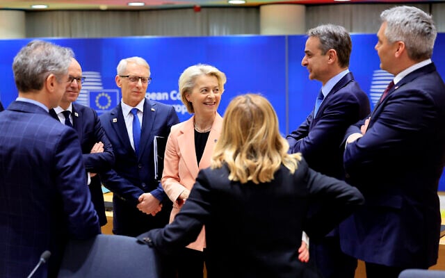 European Commission President Ursula von der Leyen, center left, speaks with from left, Slovenia's Prime Minister Robert Golob, Luxembourg's Prime Minister Luc Frieden, Bulgaria's Prime Minister Nikolai Denkov, Greece's Prime Minister Kyriakos Mitsotakis and Austria's Chancellor Karl Nehammer during a round table meeting at an EU Summit in Brussels, March 21, 2024. (AP Photo/Geert Vanden Wijngaert) European Commission President Ursula von der Leyen, center left, speaks with from left, Slovenia's Prime Minister Robert Golob, Luxembourg's Prime Minister Luc Frieden, Bulgaria's Prime Minister Nikolai Denkov, Greece's Prime Minister Kyriakos Mitsotakis and Austria's Chancellor Karl Nehammer during a round table meeting at an EU Summit in Brussels, March 21, 2024. (AP Photo/Geert Vanden Wijngaert)