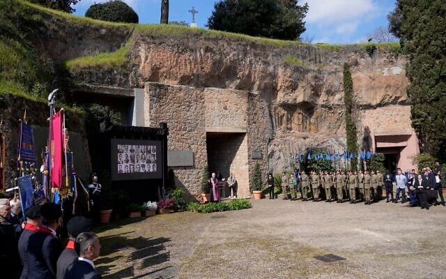 A screen shows photos of the victims of the massacre of the Ardeatine Caves during a commemorative ceremony for its 80th anniversary, in Rome, March 22, 2024. (AP Photo/Andrew Medichini) A screen shows photos of the victims of the massacre of the Ardeatine Caves during a commemorative ceremony for its 80th anniversary, in Rome, March 22, 2024. (AP Photo/Andrew Medichini)