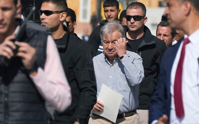 United Nations Secretary General Antonio Guterres, center, visits the Rafah border crossing between Egypt and the Gaza Strip, March 23, 2024. (AP Photo/Amr Nabil)