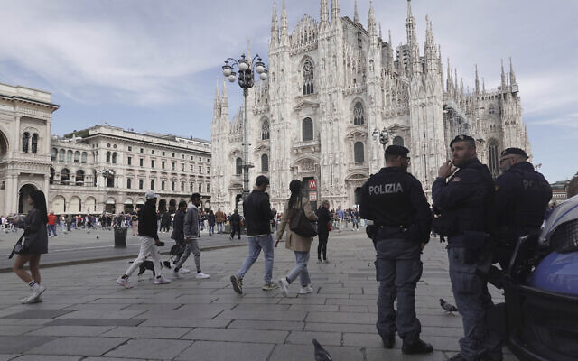 Police patrol in front of Milan gothic cathedral in Milan, March 25, 2024. (AP Photo/Luca Bruno)