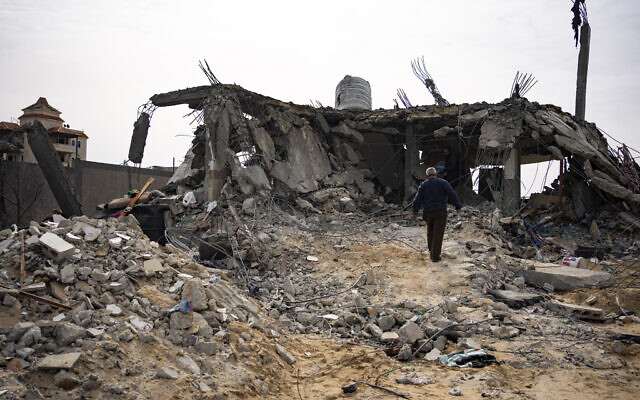 Palestinians look at a house destroyed in an Israeli strike in Rafah, Gaza Strip, March 26, 2024. (AP/Fatima Shbair) Palestinians look at a house destroyed in an Israeli strike in Rafah, Gaza Strip, March 26, 2024. (AP/Fatima Shbair)