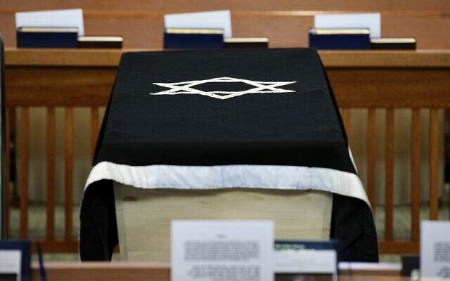 The casket of former US senator Joe Lieberman is shown in the sanctuary of Congregation Agudath Sholom, before his funeral in Stamford, Connecticut, March 29, 2024. (AP Photo/Bryan Woolston)