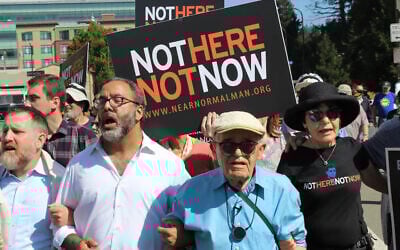 Holocaust survivor Ben Stern (blue shirt) leads 200 marchers in the "Bay Area Rally Against Hate" in Berkeley in August 2017. (Photo/Rob Gloster)