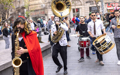 Street performers during Purim in downtown Jerusalem on March 8, 2023. (Photo by Erik Marmor/Flash90)