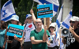 Israeli tech employees and activists protest against the government's planned judicial overhaul at Ramat Hahayal, Tel Aviv, July 4, 2023. (Miriam Alster/Flash90)