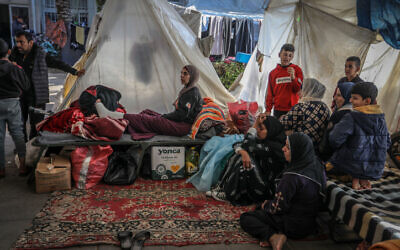 Illustrative: Palestinians who were evacuated from their homes take shelter at the European Hospital in Khan Younis, in the southern Gaza Strip on January 1, 2024. (Abed Rahim Khatib/Flash90)