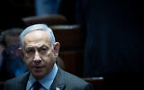 Prime Minister Benjamin Netanyahu arrives to a discussion and a vote on the expulsion of MK Ofer Cassif at the Knesset in Jerusalem, February 19, 2024 (Yonatan Sindel/Flash90).