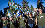Members of the Brothers in Arms movement protest outside the house of Housing Minister Yitzchak Goldknopf in Jerusalem on February 26, 2024 (Chaim Goldberg/Flash90)