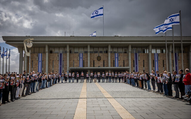 People protest for the release of Israelis held kidnapped by Hamas terrorists in Gaza since October 7, at the Knesset in Jerusalem, March 4, 2024. (Yonatan Sindel/Flash90) People protest for the release of Israelis held kidnapped by Hamas terrorists in Gaza since October 7, at the Knesset in Jerusalem, March 4, 2024. (Yonatan Sindel/Flash90)