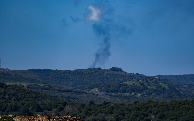 Smoke rises after rockets are fired from Lebanon at northern Israel, March 5, 2024. (Ayal Margolin/Flash90)