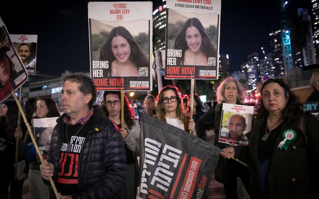 Activists protest calling for the government to find a solution to have the hostages released, outside IDF Headqurtaers in Tel Aviv, March 10, 2024. (Miriam Alster/Flash90)