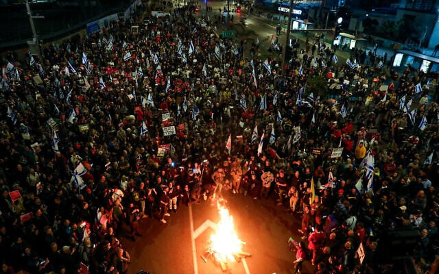 Demonstrators call for the release of hostages held by Hamas in the Gaza Strip, outside the Kirya military headquarters in Tel Aviv, March 16, 2024. (Miriam Alster/Flash90)