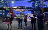 Demonstrators calling for the release of Israeli hostages held by Palestinian terrorists in the Gaza Strip, outside the Kirya military base in Tel Aviv, March 18, 2024. (Tomer Neuberg/Flash90)