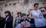 Jews attend a prayer for the return of the Israeli hostages at the Western Wall on March 21, 2024. (Chaim Goldberg/Flash90)
