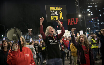 Demonstrators protest calling for the release of Israeli hostages held in the Gaza Strip rally in Tel Aviv, March 23, 2024. (Miriam Alster/Flash90)