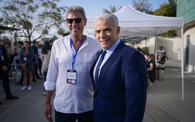 Yesh Atid leadership challenger MK Ram Ben Barak (left) and party leader Yair Lapid meet during elections for the leadership in Tel Aviv, March 28, 2024. (Avshalom Sassoni/FLASH90) Yesh Atid leadership challenger MK Ram Ben Barak (left) and party leader Yair Lapid meet during elections for the leadership in Tel Aviv, March 28, 2024. (Avshalom Sassoni/FLASH90)