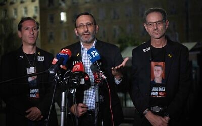 Families of Israeli soldiers abducted by Hamas terrorists on October 7, 2023, give a statement to the media after meeting with Prime Minister Benjamin Netanyahu outside the Prime Minister's office in Jerusalem, March 28, 2024. (Yonatan Sindel/Flash90)