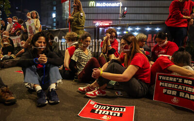 Demonstrators protest calling for the release of Israeli hostages held in the Gaza Strip and against the current Israeli government outside the IDF headquarters in Tel Aviv, March 30, 2024. (Itai Ron/Flash90)