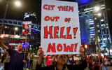 Demonstrators protest calling for the release of Israeli hostages held in the Gaza Strip outside Kirya Base in Tel Aviv, March 31, 2024. (Avshalom Sassoni/Flash90)