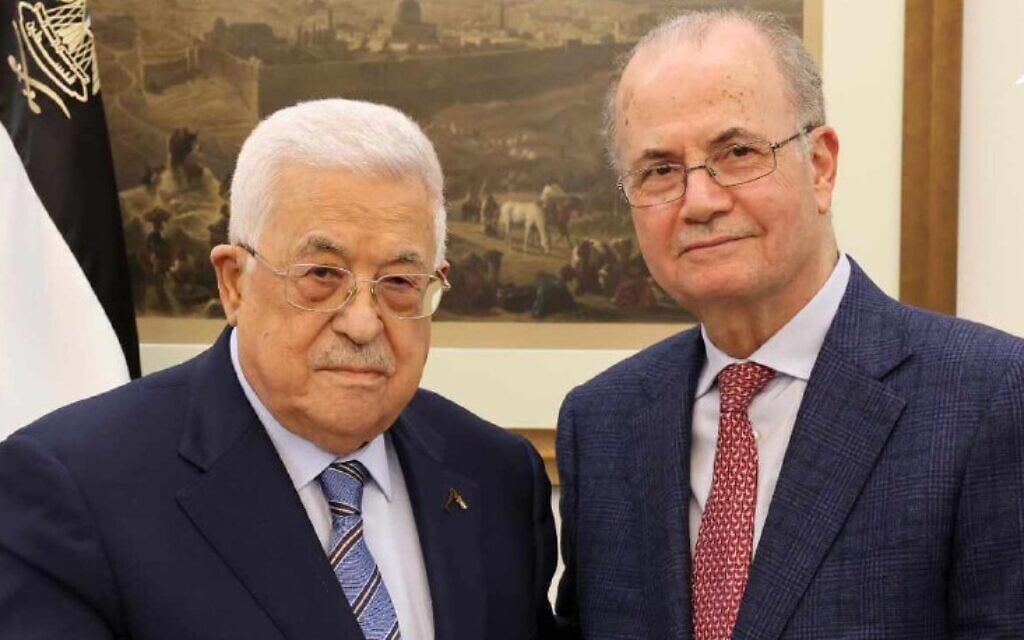 Palestinian Authority President Mahmoud Abbas (L) with Prime Minister-designate Mohammad Mustafa in Ramallah on March 14, 2024. (Wafa)