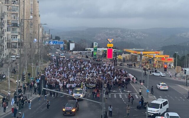 Demonstrators calling for the return of the hostages in Gaza reach Jerusalem after four-day march to the city on March 2, 2024. (Charlie Summers/Times of Israel)