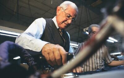 In this undated photo, Martin Greenfield, tailor for Bill Clinton and Colin Powell, appears in his Brooklyn shop. (Mark Peterson/Corbis via Getty Images via JTA)