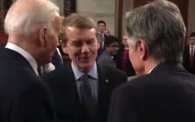 US President Joe Biden speaks to Sen. Michael Bennet (C) after his State of the Union address in Washington on March 7, 2024. (Screen capture/X) US President Joe Biden speaks to Sen. Michael Bennet (C) after his State of the Union address in Washington on March 7, 2024. (Screen capture/X)