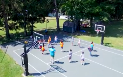 Illustrative: campers play basketball in a 2019 promotional video for Camp Twelve Trails. (Screen capture: Youtube/Camp Twelve Trails, used in accordance with Clause 27a of the Copyright Law) Illustrative: campers play basketball in a 2019 promotional video for Camp Twelve Trails. (Screen capture: Youtube/Camp Twelve Trails, used in accordance with Clause 27a of the Copyright Law)