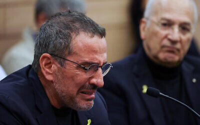 Eyal Waldman speaks in the Knesset Science Committee in Jerusalem, March 3, 2024, breaking down when talking about his daughter, who was murdered by Hamas on October 7. (Noam Moskowitz/Knesset Spokesperson's Office)