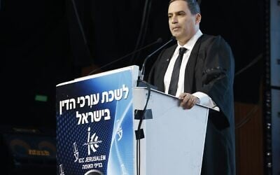 Head of the Israel Bar Association (IBA) Amit Becher addresses an IBA ceremony, March 20, 2024. (Courtesy Israel Bar Association/Yossi Zamir)