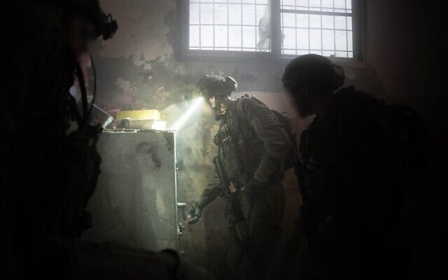 Troops operating in the Gaza Strip in an undated photo released by the military on March 21, 2024 (Israel Defense Forces)