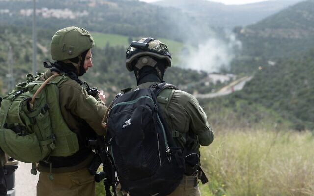 IDF troops at the scene of a shooting attack near the settlement of Dolev, March 22, 2024. (Israel Defense Forces) IDF troops at the scene of a shooting attack near the settlement of Dolev, March 22, 2024. (Israel Defense Forces)