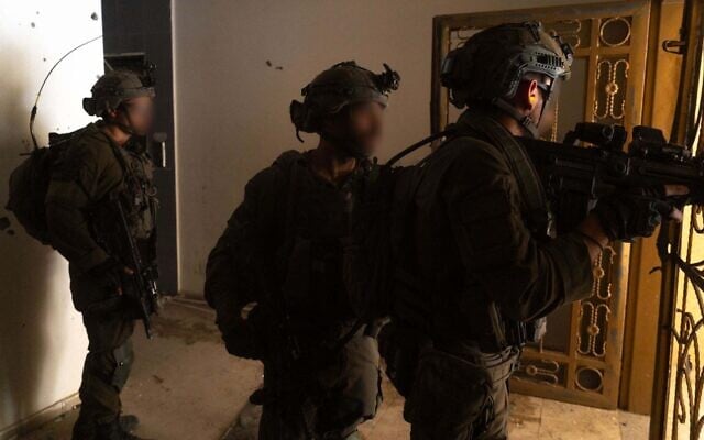 Troops of the Givati Brigade operate in southern Gaza's Khan Younis, in a handout image published March 27, 2024. (Israel Defense Forces) Troops of the Givati Brigade operate in southern Gaza's Khan Younis, in a handout image published March 27, 2024. (Israel Defense Forces)