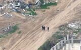 Footage shows Palestinian men walking in Khan Younis immediately before being targeted in an Israeli airstrike, in footage aired by Al Jazeera in March 2024. (Video screenshot)