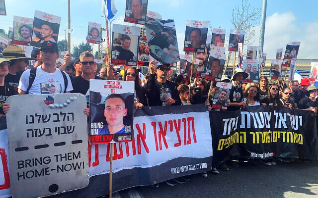 Hostage families kick off last day of 'unity march' from Re'im to Jerusalem on March 2, 2024. (Charlie Summers/Times of Israel)