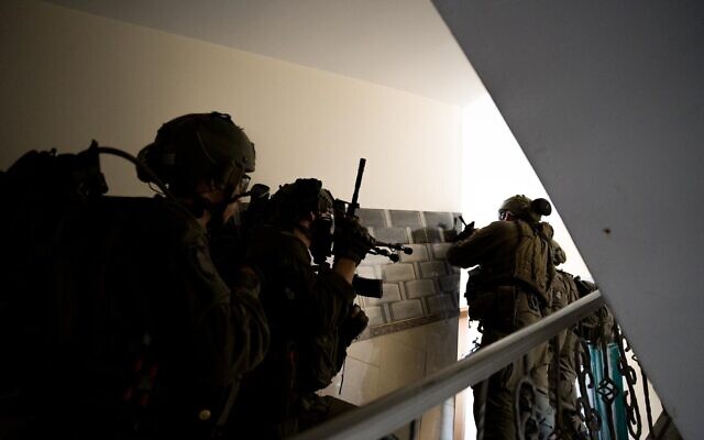 Israeli troops operating in the Gaza Strip in an undated photo released by the military for publication on March 11, 2024 (Israel Defense Forces)