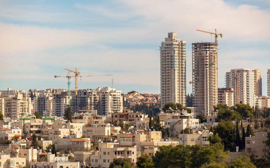 Illustrative: Tall buildings under construction in Jerusalem, June 2021. (Vladimir1965 via iStock by Getty Images) Illustrative: Tall buildings under construction in Jerusalem, June 2021. (Vladimir1965 via iStock by Getty Images)