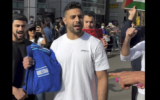 Israeli judoka Sagi Muki at a pro-Palestinian demonstration in Tokyo on March 30, 2024, shortly before his jacket was grabbed by a protester. (Video screenshot; used in accordance with clause 27a of the copyright law)